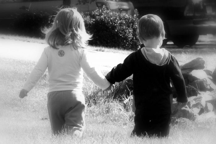 holding hands b w
